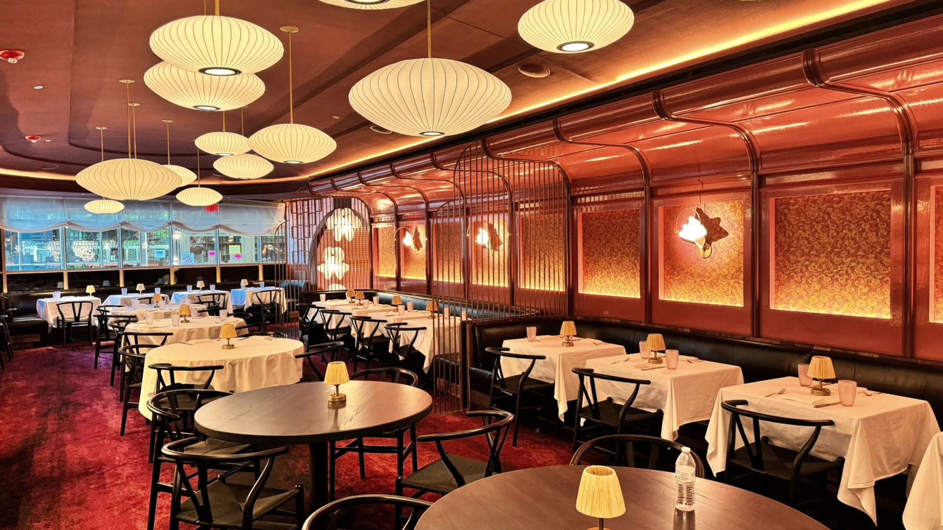 Upscale restaurant with custom wood and brass screen dividers