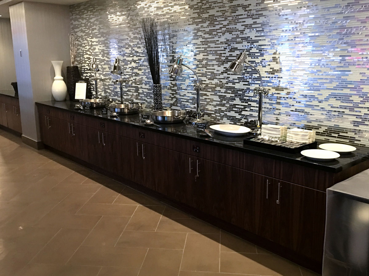 Hotel banquet buffet station with custom wood casework