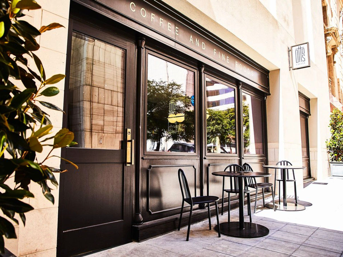 Retail storefront with a custom wood door and trim millwork